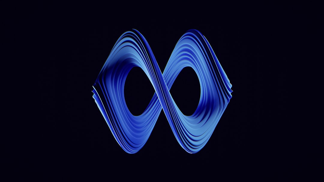 a-blue-wave-logo-on-a-black-background-h5ad1azemm8